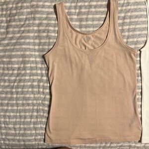 Tanks, ranging in size from XS to M.   All fit like a small.